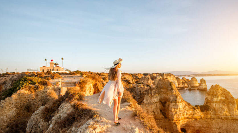 Ponta da Piedade cliffs in Lagos, Algarve at sunset — King’s Land Real Estate